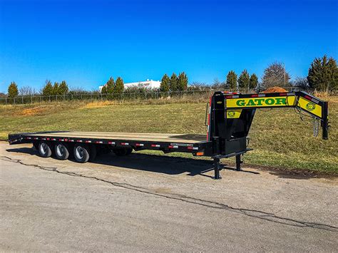 3 axle gooseneck flatbed with steel box on front|gooseneck 30k axle.